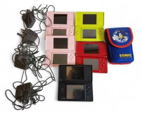 Gaming - a black Nintendo DSI console; four Nintendo DS consoles with chargers. 
