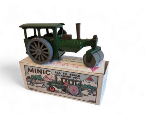 A Minic clockwork tin plate Steam Roller, grey plastic roller and wheels, green bodywork, (with later box) 