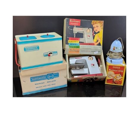 A Chad Valley tinplate Hoover Matic washing machine, boxed;&nbsp; Vulcan Classic Child's Electric sewing machine, boxed;&nbsp
