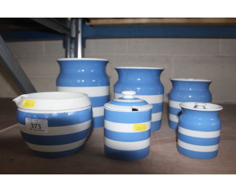 Four graduated T.G. Green Cornish ware pots with lids, a further sugar pot and a circular bowl with pouring lip