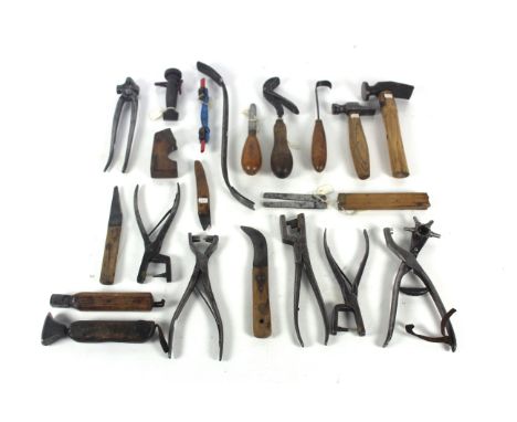 A box of shoe making or repairing tools to include George Barnsley peg knife, a George Barnsley plyer punch no. 10, a George 