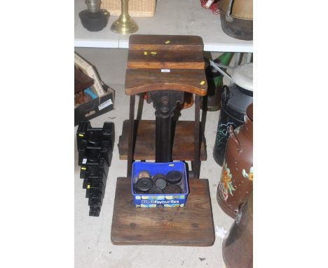 A set of sack scales and a graduated set of eight weights to weight from 56lbs to 8oz