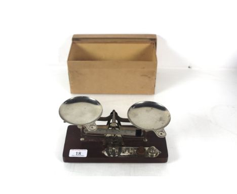 A set of Eastman Kodak Co. of Rochester New York balance scales with a set of weights (incomplete) and original box