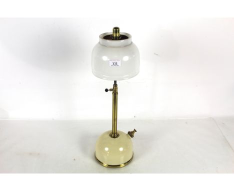 A brass mounted Tilley lamp with long stem and original white opaque shade 