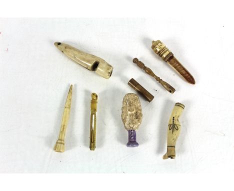 A small collection of antique bone items to including an apple corer, a stiletto pipe tamper, horn whistle pipe, clay and pot
