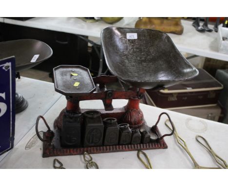 A set of vintage balance scales with original weights 