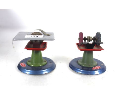 Two Wilesco mounted steam engine accessories, a small grinder and a small circular saw bench