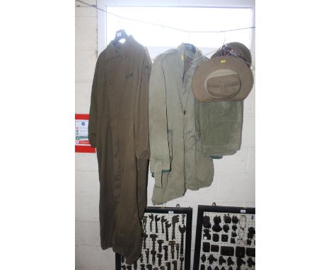 A US Army Spearhead Regiment boiler suit, old jacket, pair of trousers, and two military hats 