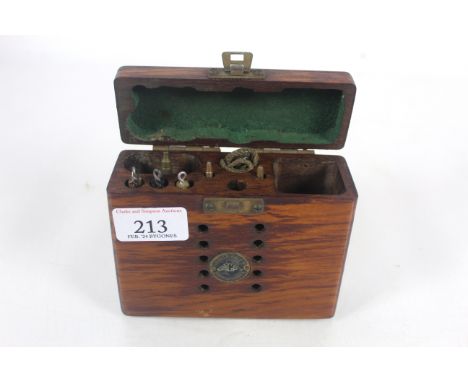 An early 20th Century Parker-Hale fitted wooden box containing a gun cleaning kit with some tools
