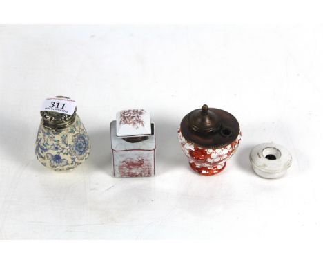 Four various ceramic and floral decorated inkwells 