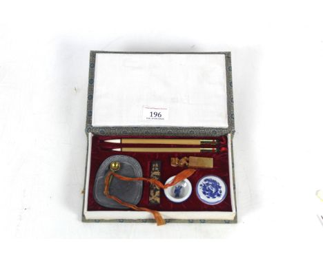 A case Oriental calligraphy writing set 