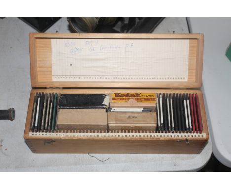 A box containing a collection of Magic Lantern slides including slides including Canada Lecture Series, various railway relat