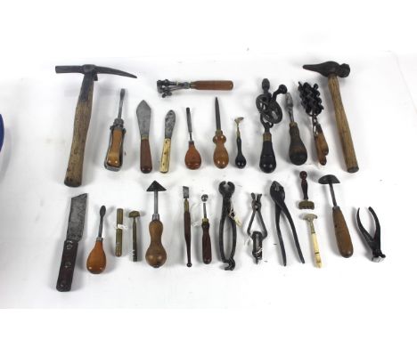 A quantity of tools including hammers, small brace, curling tongs, glass cutters, screw drivers etc.