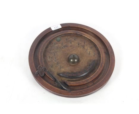 An unusual 19th Century circular wooden bagatelle board 