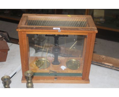 A cased set of laboratory scales