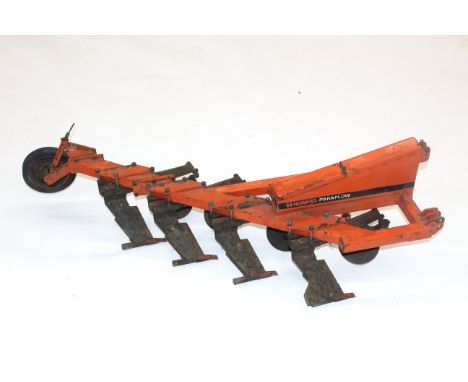 A scale model of a Howard Paraplow 3+1 furrow mounted plough. Complete with spare wearing metal and shear bolts in the toolbo