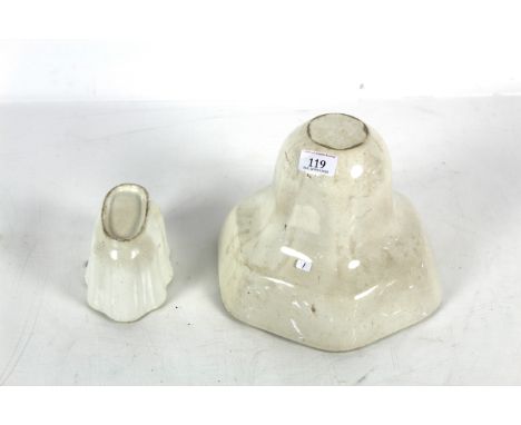 Two ceramic jelly moulds, one large and one small 