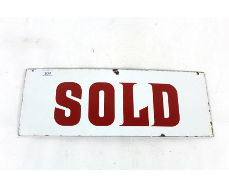 A white and red enamel sign "Sold", approx. 19½" x 7½"
