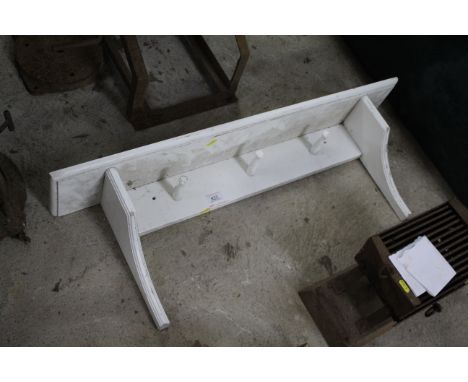 A white painted shelf coat rack