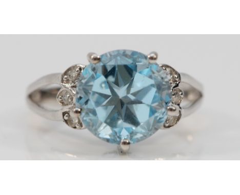 A 10k white gold blue topaz and diamond dress ring, L, 4.3g 