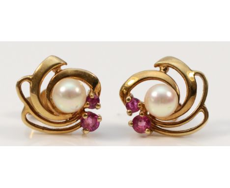 A pair of 9ct gold cultured pearl and ruby stud earrings with scroll backs, 12mm diameter, 1.7g 