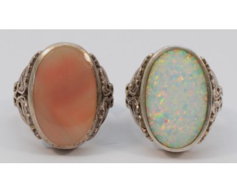 David Scott Walker, Sheffield, a silver opal mounted dress ring, stone 21 x 14mmR and another by the same set with mother of 