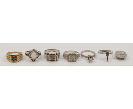 A 925 silver, opal doublet and white stone cluster ring, N and five other 925 silver dress rings, one converts to a pendant, 