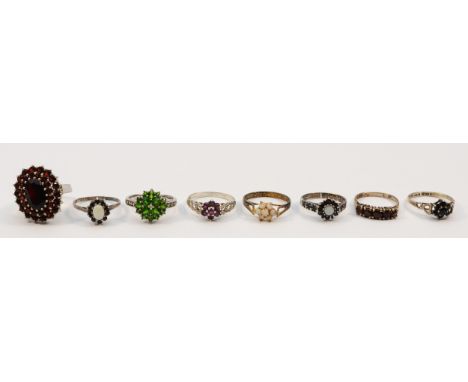 A silver opal and sapphire cluster ring, O, and seven other silver gemset rings, 13gm