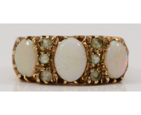 A 9ct gold vintage opal and white gemstone dress ring, London 1973, O 1/2, 4.4g 