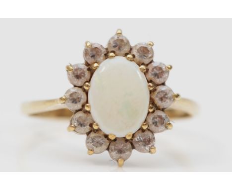 A 9ct gold opal and cubic zirconia cluster ring, N, 1.7g 