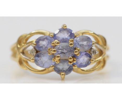 A 9ct gold tanzanite and diamond dress ring, claw set, P, 2.3g 