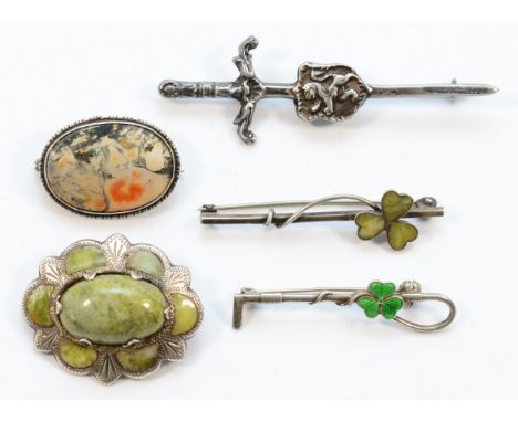 Robert Allison, a Scottish silver broadsword and shield brooch and four other silver Celtic brooches