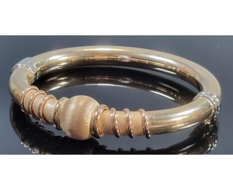 14ct gold two tone modernist bangle.  32g.2g.  (B.P. 21% + VAT) 