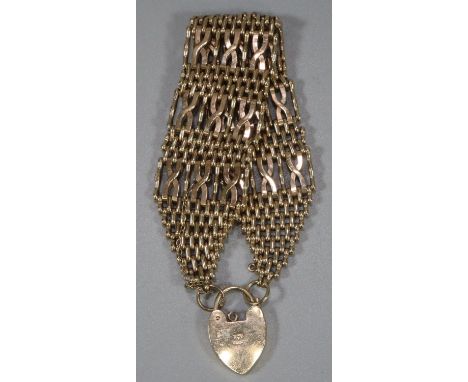 9ct gold wide gate bracelet with heart padlock.  45g approx.  (B.P. 21% + VAT) 