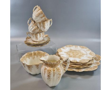 Late 19th century 36 piece Wileman &amp; Co. fluted and shell design tea set comprising: ten cups and saucers, twelve side pl