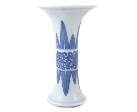 Chinese Kangxi vase, sleeve form painted in underglaze blue with six-character mark and period.14cm highCondition report: No 