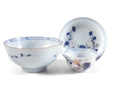 Chinese Nanking Cargo bowl and teabowl and saucer circa 1750, painted with underglaze blue patterns.  The bowl measures 15cm 