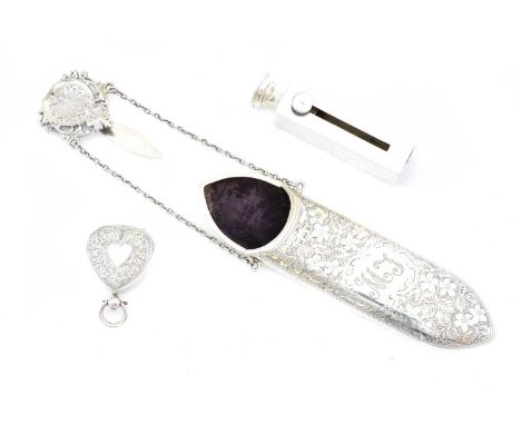 A selection of silver, to include a silver glasses holder, lipstick case and a heart shaped sovereign holder, gross weight 3.