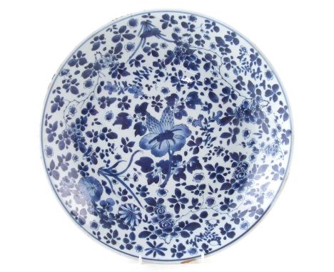 Chinese dish, painted in blue and white with flowers, Kangxi period 1662 - 1722.34cm diameterCondition report: Chips to the r