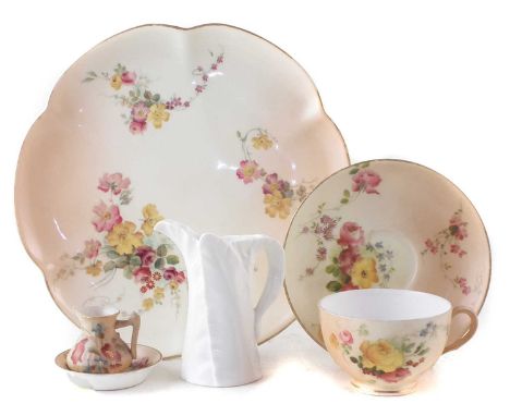 Collection of Royal Worcester, to include a miniature jug and bowl, cup and saucer and a cake stand, also a white glazed leaf
