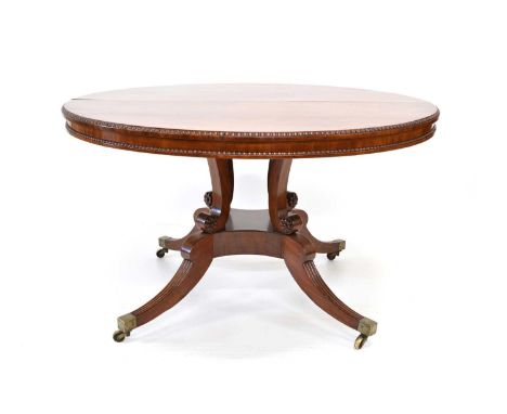 Regency mahogany breakfast table, circular figured mahogany top with beaded edge and 4cm frieze, base with four scroll column