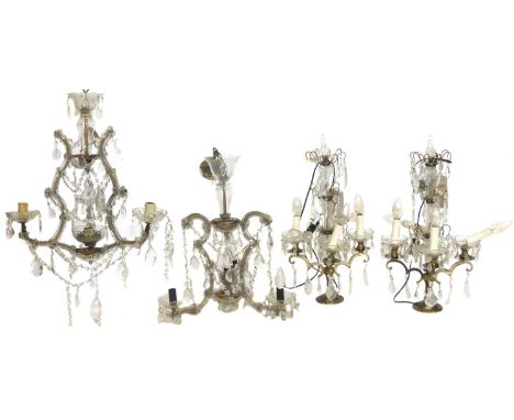 A pair of 20th century cut glass, four branch table lamps, and two other three-branch electroliers of similar design.lamps 56