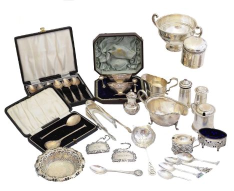 A selection of silver, to include a silver fluted vase, a silver twin handled cup, silver sauce boats, silver cruet sets, sil