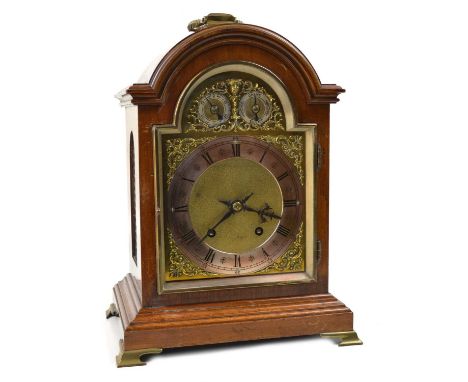 Late 19th century two train bracket clock, eight day movement, striking on two gongs, brass arched dial, two secondary dials,
