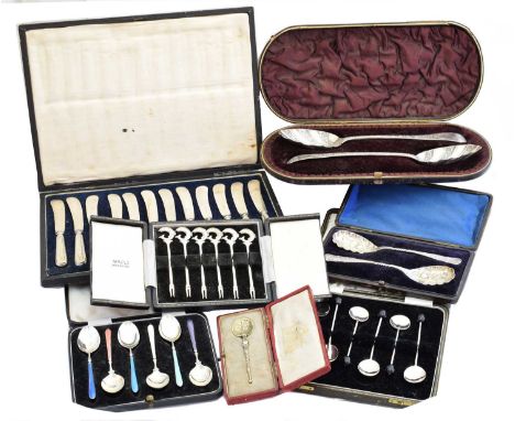 A selection of cased silver flatware, to include a pair of silver George III silver spoons with later engraved decoration, a 