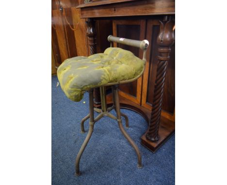 A Victorian brass and button upholstered revolving C H Hare patent cellist's chair. Condition Report: commensurate with age a