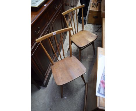 A pair of Ercol dining chairs. 
