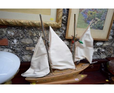 An unusual novelty pond yacht form lamp, the hull 60cm long. 
