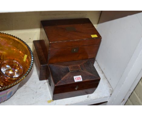 A 19th century mahogany tea caddy; and two further 19th century caskets. 