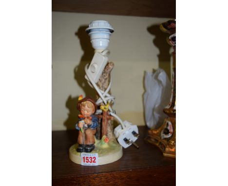 A Hummel figural lamp base, height excluding fitting 19cm. 